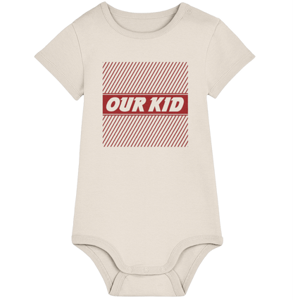 Natural Raw coloured babygrow with a red 'OUR KID' graphic in a no-frills supermarket-style design on a white background